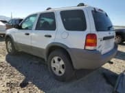 ✅ 2001 Ford Escape XLT • VIN: 1FMYU04171KB22933 • Лот: 69323215. Опубликован ранее на Copart с пробегом 251 712 миль. Бесплатный доступ к архиву аукционных продаж из США и подробный отчёт об истории автомобиля на DreamBid. Изображение 2.