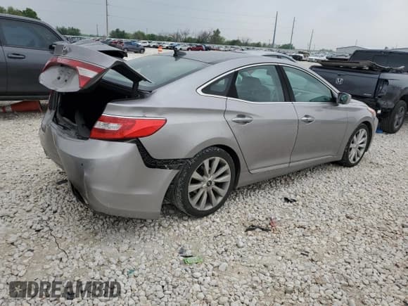 ✅ 2013 Hyundai Azera • VIN: KMHFH4JG5DA327155 • Лот: 51076905. Опубликован ранее на Copart с пробегом 228 236 миль. Бесплатный доступ к архиву аукционных продаж из США и подробный отчёт об истории автомобиля на DreamBid. Изображение 3.