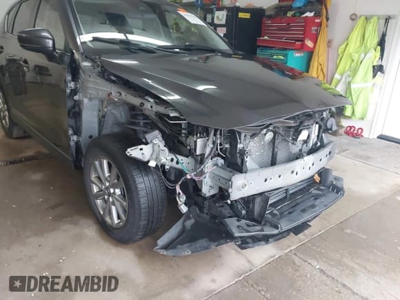 ✅ 2022 Mazda CX-5 S Carbon Edition • VIN: JM3KFBCM1N0577670 • Лот: 43821338. Опубликован ранее на IAAI с пробегом 59 967 миль. Бесплатный доступ к архиву аукционных продаж из США и подробный отчёт об истории автомобиля на DreamBid. Изображение 6.