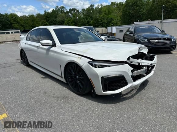 ✅ 2020 BMW 7 Series 740i xDrive • VIN: WBA7T4C04LCE19948 • Lot: 61751895. Listed on Copart with 37,579 mi. Free auction sales archive from the USA and detailed vehicle history report at DreamBid. Image 4.