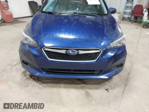 ✅ 2017 Subaru Impreza Premium • VIN: 4S3GTAB61H3746352 • Lot: 41015722. Listed on IAAI with 73,029 mi. Free auction sales archive from the USA and detailed vehicle history report at DreamBid. Image 12.