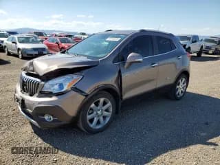 ✅ 2014 Buick Encore Premium • VIN: KL4CJHSB1EB729573 • Lot: 63140335. Wystawiony na Copart z przebiegiem 50 296 mil. Bezpłatny archiwum sprzedaży aukcyjnych z USA i szczegółowy raport historii pojazdu na DreamBid. Zdjęcie 1.