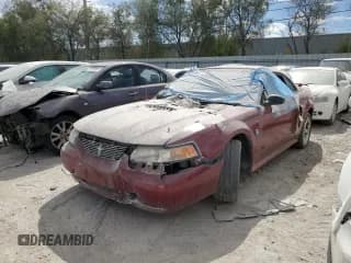 ✅ 2004 Ford Mustang GT Deluxe • VIN: 1FAFP45X04F206124 • Лот: 64428205. Опубликован ранее на Copart с пробегом Не указан. Бесплатный доступ к архиву аукционных продаж из США и подробный отчёт об истории автомобиля на DreamBid. Изображение 1.