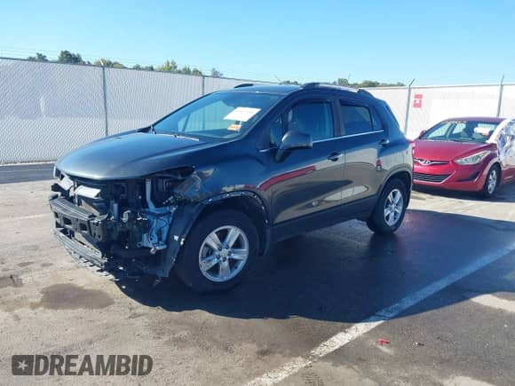 2018 Chevrolet Trax LT z VIN 3GNCJPSBXJL235003, wystawiony jako IAAI lot #43417135 z przebiegiem 86 123 mil mil oraz . Historia ofert i sprzedaży dostępna na DreamBid. Obrazek 2.