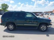 ✅ 2002 Chevrolet Tahoe LT • VIN: 1GNEC13Z42J343170 • Lot: 42595305. Listed on IAAI with 383,405 mi. Free auction sales archive from the USA and detailed vehicle history report at DreamBid. Image 13.