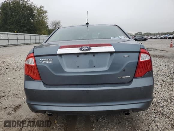 ✅ 2012 Ford Fusion SEL • VIN: 3FAHP0JG6CR218559 • Lot: 90133975. Listed on Copart with 141,409 mi. Free auction sales archive from the USA and detailed vehicle history report at DreamBid. Image 6.