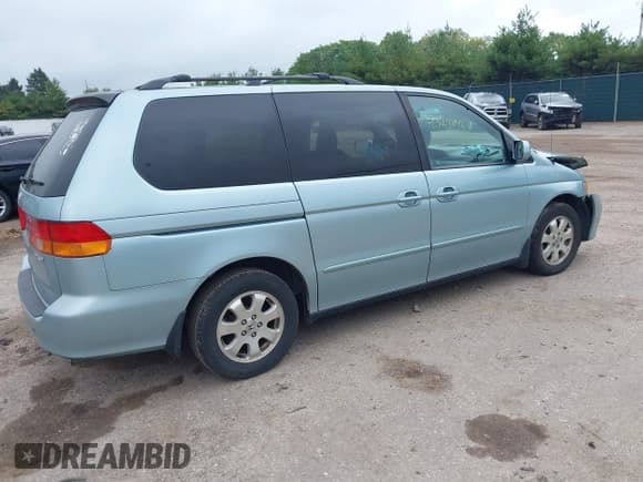 ✅ 2002 Honda Odyssey EX • VIN: 2HKRL18662H587193 • Lot: 43293042. Listed on IAAI with 126,663 mi. Free auction sales archive from the USA and detailed vehicle history report at DreamBid. Image 4.
