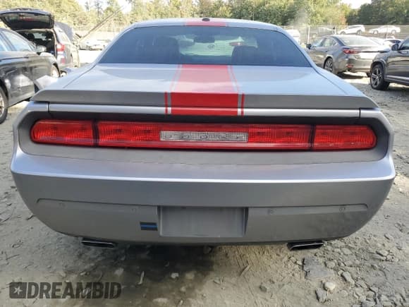 ✅ 2014 Dodge Challenger SXT • VIN: 2C3CDYAG3EH142443 • Lot: 75846514. Wystawiony na Copart z przebiegiem 94 377 mil. Bezpłatny archiwum sprzedaży aukcyjnych z USA i szczegółowy raport historii pojazdu na DreamBid. Zdjęcie 6.