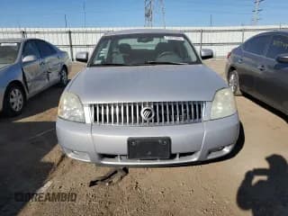 ✅ 2005 Mercury Montego Luxury • VIN: 1MEFM40175G607086 • Лот: 74675984. Опубликован ранее на Copart с пробегом 106 236 миль. Бесплатный доступ к архиву аукционных продаж из США и подробный отчёт об истории автомобиля на DreamBid. Изображение 5.