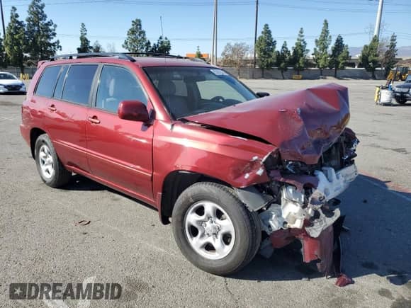 2007 Toyota Highlander w/3rd Row with VIN JTEDD21AX70160062, listed as a Copart auction lot 85805524 with 254,475 mi miles and Salvage title. Bid and sale history available at DreamBid. Image 4.