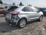 ✅ 2023 Ford Edge Titanium • VIN: 2FMPK4K99PBA29951 • Лот: 69757105. Опубликован ранее на Copart с пробегом 60 912 миль. Бесплатный доступ к архиву аукционных продаж из США и подробный отчёт об истории автомобиля на DreamBid. Изображение 3.