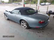 ✅ 2004 Jaguar XK • VIN: SAJDA42C442A37063 • Lot: 41382711. Listed on IAAI with 90,010 mi. Free auction sales archive from the USA and detailed vehicle history report at DreamBid. Image 3.