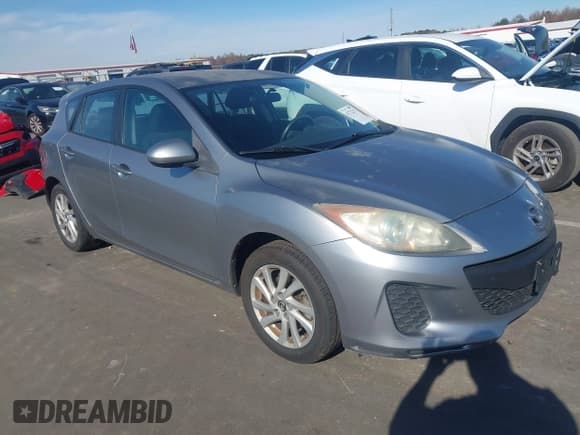 ✅ 2013 Mazda 3 i Touring • VIN: JM1BL1L7XD1705659 • Lot: 43732317. Listed on IAAI with 129,468 mi. Free auction sales archive from the USA and detailed vehicle history report at DreamBid. Image 1.