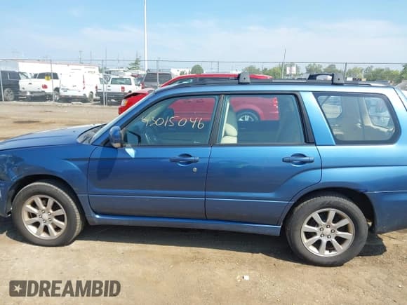 ✅ 2007 Subaru Forester X • VIN: JF1SG65687H711290 • Lot: 43015046. Listed on IAAI with 174,162 mi. Free auction sales archive from the USA and detailed vehicle history report at DreamBid. Image 14.