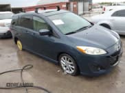 ✅ 2012 Mazda 5 Grand Touring • VIN: JM1CW2DLXC0124793 • Lot: 43796644. Listed on IAAI with 146,822 mi. Free auction sales archive from the USA and detailed vehicle history report at DreamBid. Image 1.