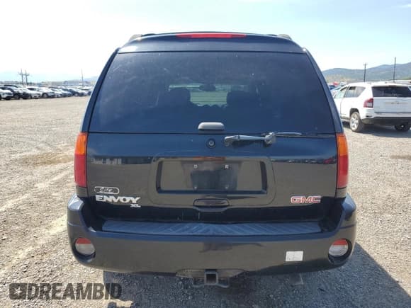 ✅ 2005 GMC Envoy SLT • VIN: 1GKET16S056174980 • Lot: 65994695. Listed on Copart with 140,649 mi. Free auction sales archive from the USA and detailed vehicle history report at DreamBid. Image 6.