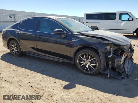 2021 Toyota Camry Hybrid SE с VIN 4T1G31AK2MU564917, выставлен на аукционе Copart как лот 71824255 с пробегом 181 375 миль миль и Списание • Salvage title. История ставок и продаж доступна на DreamBid. Изображение 4.