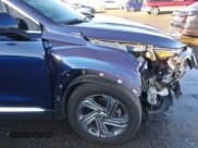 ✅ 2021 Hyundai Santa Fe SEL • VIN: 5NMS2DAJ8MH349334 • Lot: 43622556. Listed on IAAI with 88,395 mi. Free auction sales archive from the USA and detailed vehicle history report at DreamBid. Image 18.