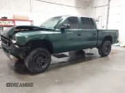 ✅ 2000 Dodge Dakota Sport • VIN: 1B7HG2AZ7YS777329 • Lot: 41592831. Wystawiony na IAAI z przebiegiem 204 067 mil. Bezpłatny archiwum sprzedaży aukcyjnych z USA i szczegółowy raport historii pojazdu na DreamBid. Zdjęcie 2.