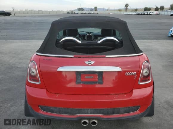 ✅ 2009 MINI Convertible S • VIN: WMWMS33569TG89140 • Lot: 92157175. Wystawiony na Copart z przebiegiem 125 093 mil. Bezpłatny archiwum sprzedaży aukcyjnych z USA i szczegółowy raport historii pojazdu na DreamBid. Zdjęcie 6.