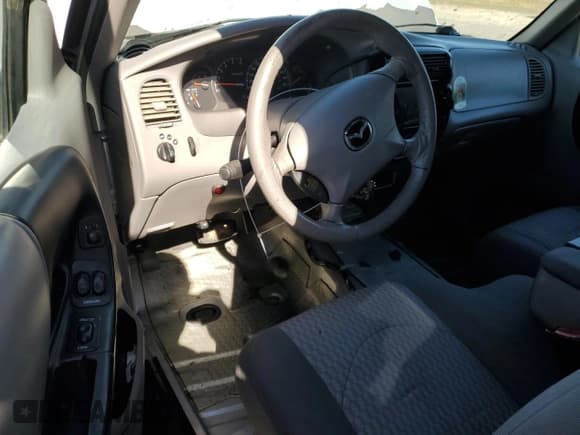 ✅ 2002 Mazda B-Series DS • VIN: 4F4YR16U32TM09501 • Лот: 76968614. Опубликован ранее на Copart с пробегом 209 252 миль. Бесплатный доступ к архиву аукционных продаж из США и подробный отчёт об истории автомобиля на DreamBid. Изображение 8.