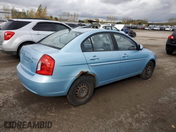 2010 Hyundai Accent GL with VIN KMHCN4BC9AU394049, listed as a Copart auction lot 86221915 with 235,404 mi miles and Clean title. Bid and sale history available at DreamBid. Image 3.