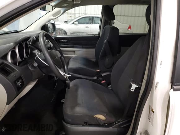 ✅ 2009 Dodge Grand Caravan SE • VIN: 2D8HN44E99R542025 • Lot: 61003595. Wystawiony na Copart z przebiegiem 222 476 mil. Bezpłatny archiwum sprzedaży aukcyjnych z USA i szczegółowy raport historii pojazdu na DreamBid. Zdjęcie 7.