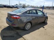 ✅ 2015 Ford Fiesta Titanium • VIN: 3FADP4CJ4FM110781 • Lot: 54141695. Wystawiony na Copart z przebiegiem 108 612 mil. Bezpłatny archiwum sprzedaży aukcyjnych z USA i szczegółowy raport historii pojazdu na DreamBid. Zdjęcie 3.