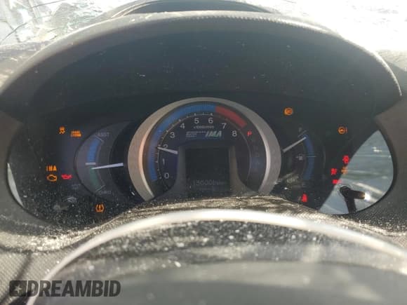 ✅ 2011 Honda Insight LX • VIN: JHMZE2H55BS002384 • Лот: 70058595. Опубликован ранее на Copart с пробегом 130 006 миль. Бесплатный доступ к архиву аукционных продаж из США и подробный отчёт об истории автомобиля на DreamBid. Изображение 9.