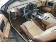 ✅ 1984 Pontiac Fiero • VIN: 1G2AF37R6EP320306 • Lot: 68255394. Wystawiony na Copart z przebiegiem 49 284 mil. Bezpłatny archiwum sprzedaży aukcyjnych z USA i szczegółowy raport historii pojazdu na DreamBid. Zdjęcie 8.