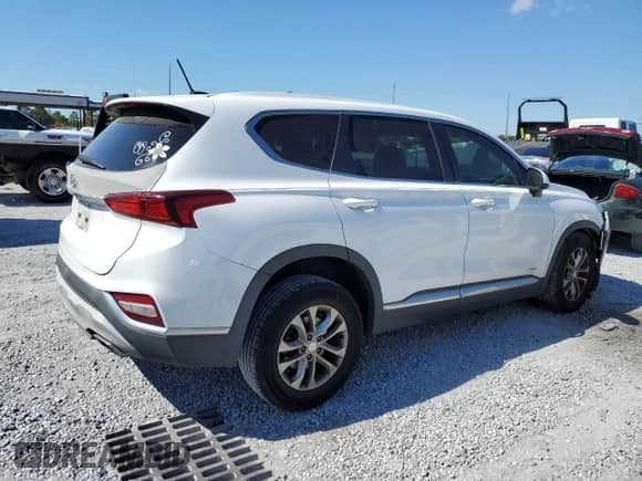 2019 Hyundai Santa Fe SE с VIN 5NMS23AD0KH001903, выставлен на аукционе Copart как лот 91165425 с пробегом 69 358 миль миль и Списание • Salvage title. История ставок и продаж доступна на DreamBid. Изображение 3.