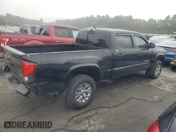 ✅ 2018 Toyota Tacoma TRD Off Road • VIN: 3TMDZ5BNXJM044910 • Lot: 80719065. Listed on Copart with 71,428 mi. Free auction sales archive from the USA and detailed vehicle history report at DreamBid. Image 3.