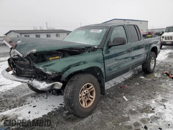 ✅ 2002 Dodge Dakota SLT • VIN: 1B7HG48N12S614309 • Lot: 87309554. Wystawiony na Copart z przebiegiem 287 994 mil. Bezpłatny archiwum sprzedaży aukcyjnych z USA i szczegółowy raport historii pojazdu na DreamBid. Zdjęcie 1.