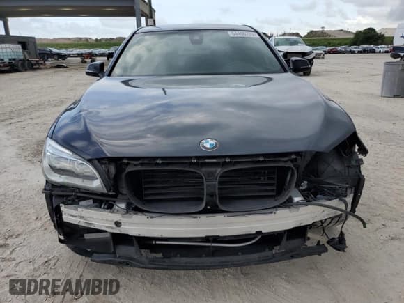 ✅ 2013 BMW 7 Series 750i • VIN: WBAYA8C56DC996704 • Лот: 64466705. Опубликован ранее на Copart с пробегом 102 278 миль. Бесплатный доступ к архиву аукционных продаж из США и подробный отчёт об истории автомобиля на DreamBid. Изображение 5.