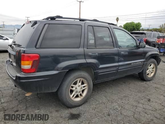2004 Jeep Grand Cherokee Laredo с VIN 1J4GX48S14C404012, выставлен на аукционе Copart как лот 70741615 с пробегом 188 675 миль миль и Списание • Salvage title. История ставок и продаж доступна на DreamBid. Изображение 3.