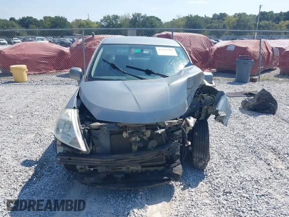 ✅ 2010 Nissan Versa S • VIN: 3N1BC1AP8AL393352 • Лот: 43222504. Опубликован ранее на IAAI с пробегом 157 069 миль. Бесплатный доступ к архиву аукционных продаж из США и подробный отчёт об истории автомобиля на DreamBid. Изображение 13.