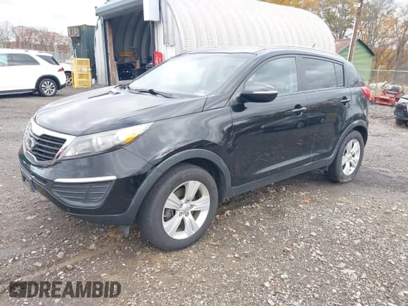 ✅ 2012 Kia Sportage LX • VIN: KNDPB3A2XC7215438 • Lot: 43578860. Listed on IAAI with 116,723 mi. Free auction sales archive from the USA and detailed vehicle history report at DreamBid. Image 2.