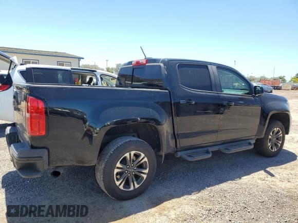 ✅ 2021 Chevrolet Colorado 4WD Z71 • VIN: 1GCGTDEN7M1128060 • Лот: 66130584. Опубликован ранее на Copart с пробегом 88 935 миль. Бесплатный доступ к архиву аукционных продаж из США и подробный отчёт об истории автомобиля на DreamBid. Изображение 3.
