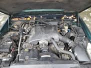 ✅ 2000 Ford Crown Victoria • VIN: 2FAFP73W2YX105933 • Lot: 89862835. Wystawiony na Copart z przebiegiem 233 480 mil. Bezpłatny archiwum sprzedaży aukcyjnych z USA i szczegółowy raport historii pojazdu na DreamBid. Zdjęcie 11.