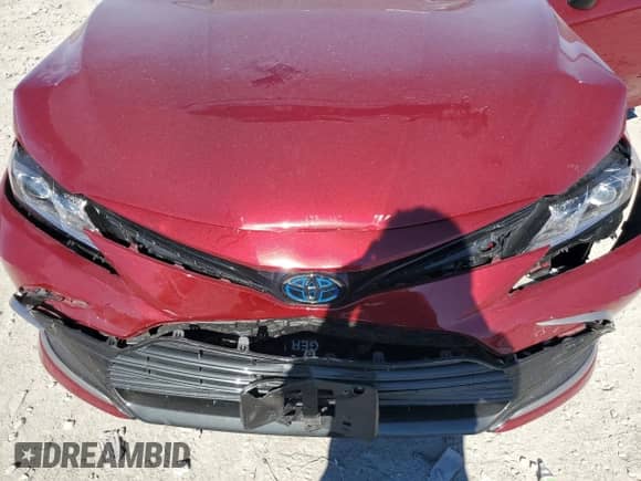 2021 Toyota Camry Hybrid LE with VIN 4T1C31AK1MU559738, listed as a Copart auction lot 85496625 with 27,669 mi miles and Salvage title. Bid and sale history available at DreamBid. Image 11.