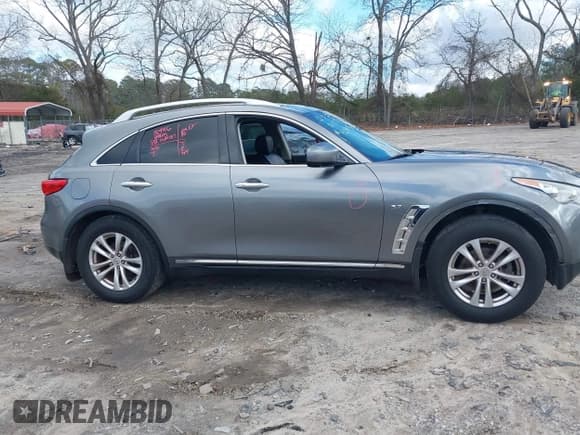 ✅ 2015 Infiniti QX70 • VIN: JN8CS1MWXFM480906 • Лот: 41177811. Опубликован ранее на IAAI с пробегом 176 527 миль. Бесплатный доступ к архиву аукционных продаж из США и подробный отчёт об истории автомобиля на DreamBid. Изображение 13.