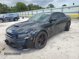 ✅ 2021 Dodge Charger SRT Hellcat Widebody • VIN: 2C3CDXL9XMH585938 • Lot: 64855165. Wystawiony na Copart z przebiegiem 49 881 mil. Bezpłatny archiwum sprzedaży aukcyjnych z USA i szczegółowy raport historii pojazdu na DreamBid. Zdjęcie 1.