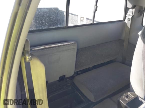 ✅ 1997 Dodge Dakota • VIN: 1B7GL23Y6VS207961 • Lot: 43703708. Wystawiony na IAAI z przebiegiem 297 431 mil. Bezpłatny archiwum sprzedaży aukcyjnych z USA i szczegółowy raport historii pojazdu na DreamBid. Zdjęcie 8.