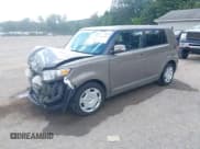 ✅ 2012 Scion xB • VIN: JTLZE4FE1CJ021817 • Lot: 43088083. Listed on IAAI with 115,012 mi. Free auction sales archive from the USA and detailed vehicle history report at DreamBid. Image 2.