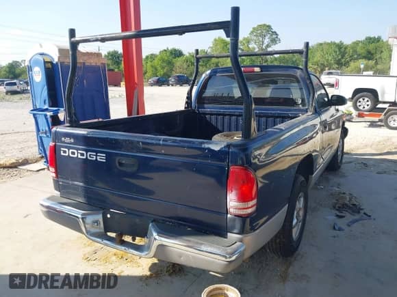 2000 Dodge Dakota with VIN 1B7FL26X5YS739995, listed as a IAAI auction lot 41694016 with 197,663 mi miles and . Bid and sale history available at DreamBid. Image 4.