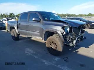 2022 Toyota Tacoma SR5 with VIN 3TMAZ5CN8NM181805, listed as a IAAI auction lot 43143864 with 66,586 mi miles and . Bid and sale history available at DreamBid. Image 1.