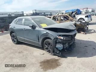 ✅ 2023 Mazda CX-30 S Carbon Edition • VIN: 3MVDMBCM2PM574654 • Lot: 43139795. Listed on IAAI with 31,768 mi. Free auction sales archive from the USA and detailed vehicle history report at DreamBid. Image 1.