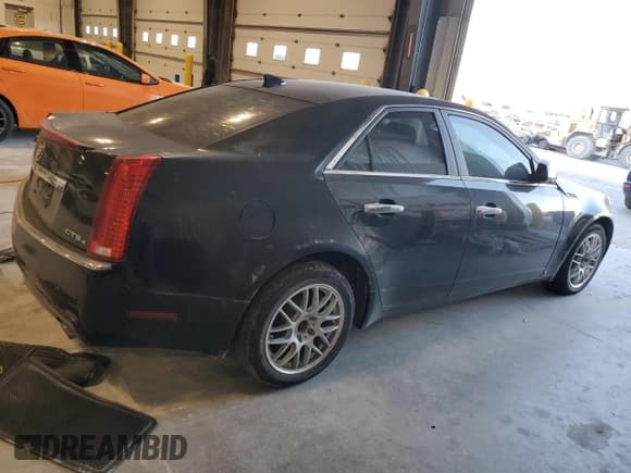 ✅ 2009 Cadillac CTS AWD • VIN: 1G6DG577690100844 • Лот: 86659585. Опубликован ранее на Copart с пробегом 195 327 миль. Бесплатный доступ к архиву аукционных продаж из США и подробный отчёт об истории автомобиля на DreamBid. Изображение 3.