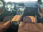 ✅ 2023 BMW X6 xDrive40i • VIN: 5UXCY6C03P9R77741 • Лот: 90633015. Опубликован ранее на Copart с пробегом 10 889 миль. Бесплатный доступ к архиву аукционных продаж из США и подробный отчёт об истории автомобиля на DreamBid. Изображение 8.