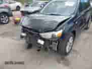 2014 Mitsubishi Outlander ES with VIN 4A4AR3AU7EE002506, listed as a IAAI auction lot 43083381 with 87,329 mi miles and . Bid and sale history available at DreamBid. Image 6.